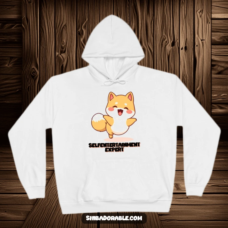 Funny happy Shiba Inu hoodie depicting a dog playfully chasing its tail in a circle, offering cozy fun.