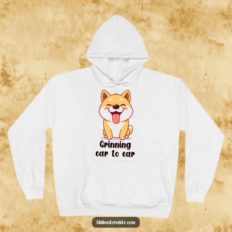 Funny Shiba Inu hoodie showing a happy dog panting with a huge, goofy grin, perfect for cozy humor.