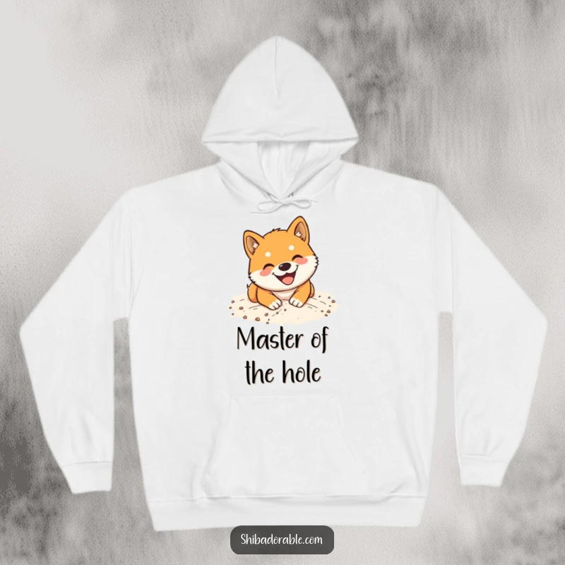 Funny Shiba Inu Hoodie: Warm sweatshirt featuring a happy dog digging enthusiastically in sandy terrain with a wide grin.
