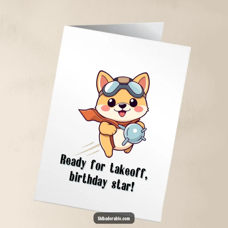 Funny Free Printable Birthday Card: Shiba Inu puppy pilot in hat, excitedly zooming with propeller, ready for adventure.