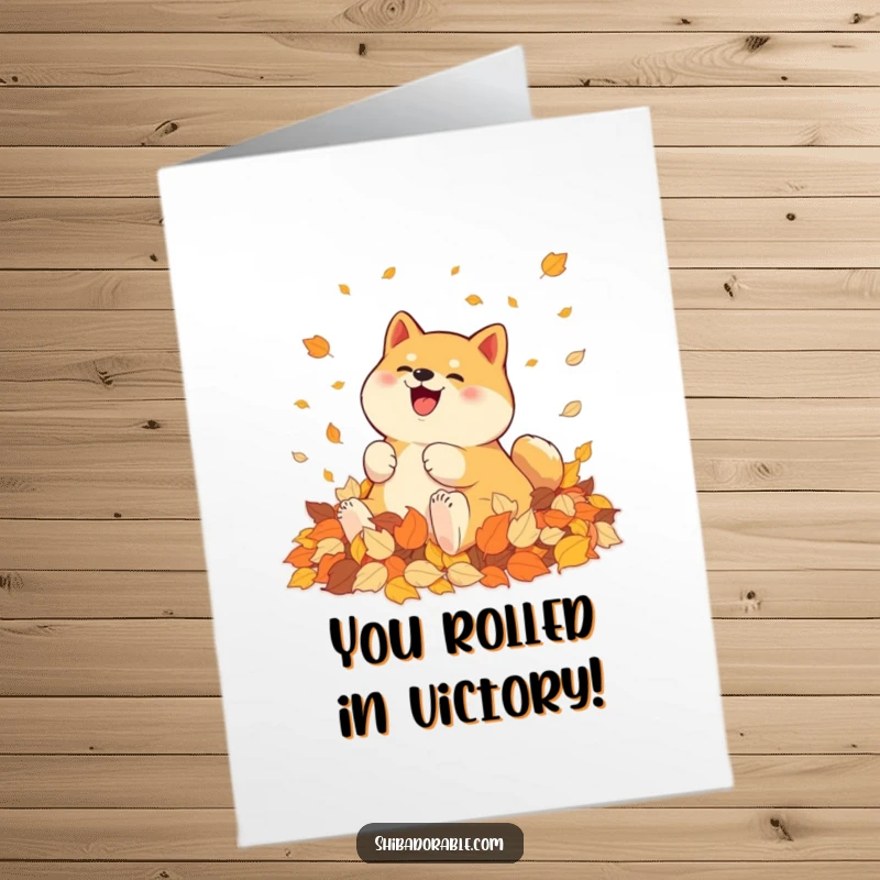 Funny Free Printable Congratulations Card: A Shiba Inu gleefully rolling amidst a thick pile of vibrant autumn leaves.