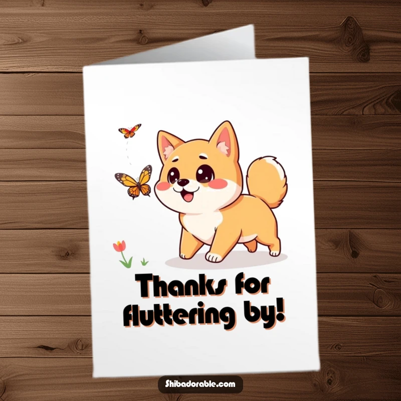 Free Printable Thank You Card: A happy Shiba Inu with curious eyes is playfully chasing a butterfly.