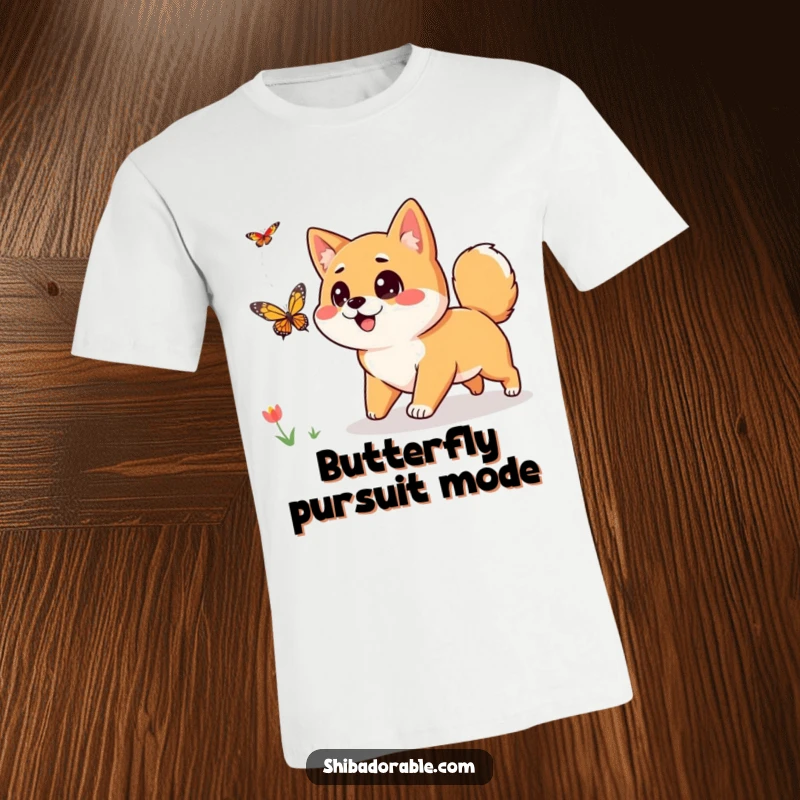 Funny Shiba Inu T-Shirt: A curious Shiba Inu with wide eyes playfully pursues a butterfly, embodying pure, joyful excitement.