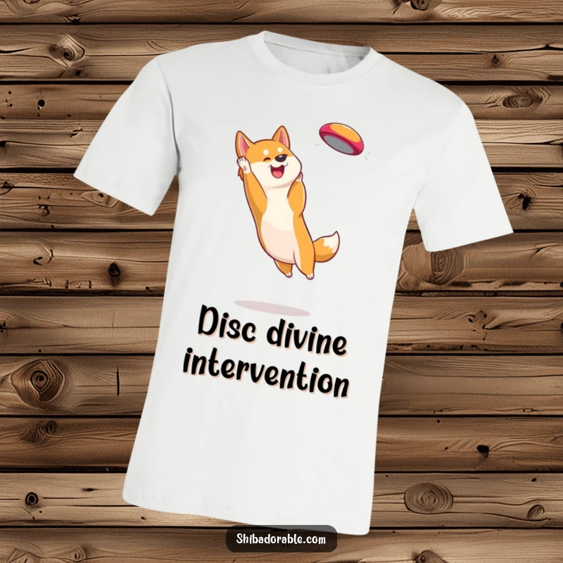 Funny Shiba Inu T-Shirt: Dynamic graphic of a Shiba Inu with alert ears leaping to catch a vibrant frisbee in mid-air.