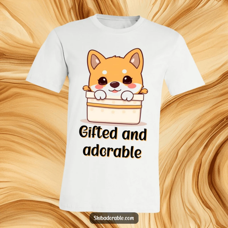 Funny Shiba Inu puppy peeking curiously from an open gift box on a comfortable t-shirt.