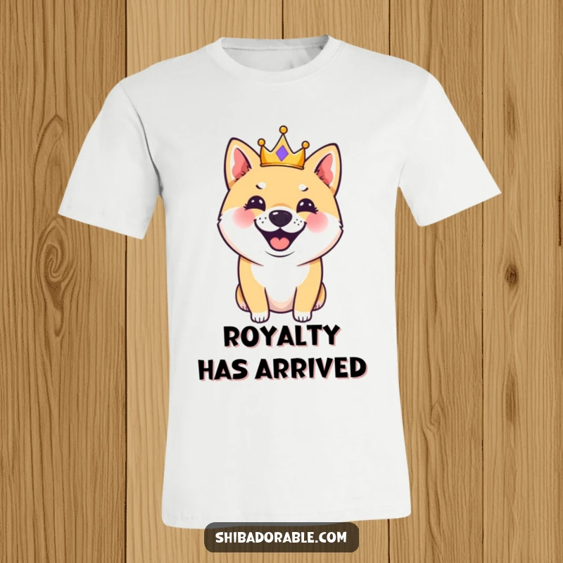 Funny, happy Shiba Inu dog in a small crown, mid-bark, printed on a comfortable t-shirt, exuding playful royalty and joy.