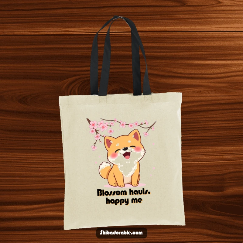 Funny Shiba Inu tote bag depicting a dog comically chasing falling cherry blossoms, ideal for shopping and smiles.